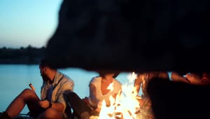 Download Video Stock Campers Grilling Food At The Campfire Live Wallpaper For PC