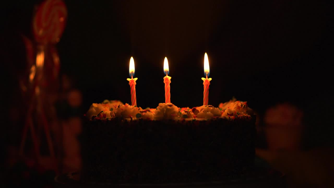 Download Video Stock Cake With Burning Candles In The Dark Live Wallpaper For PC