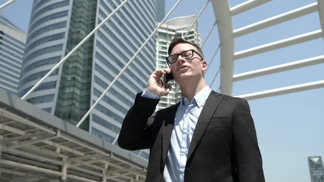 Download Video Stock Businessman On Call In The City Live Wallpaper For PC