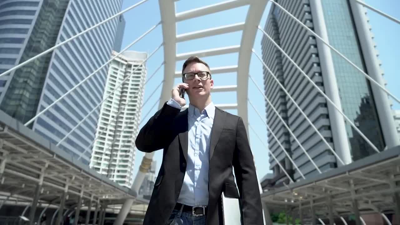 Download Video Stock Businessman On A Call On The Street Live Wallpaper For PC