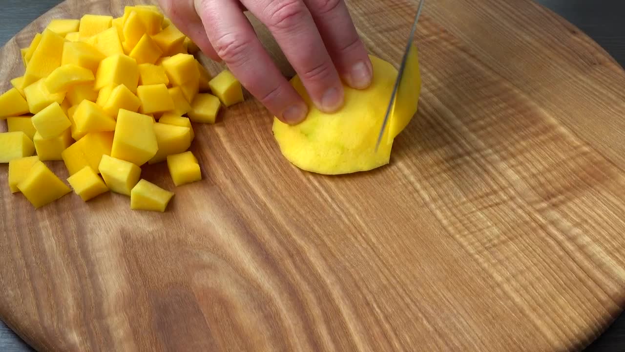 Download Stock Video Cutting Mango Cubes On A Board Live Wallpaper For PC