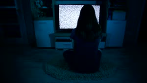 Download Stock Video Creepy Woman Looking At Static On A Tv Live Wallpaper For PC