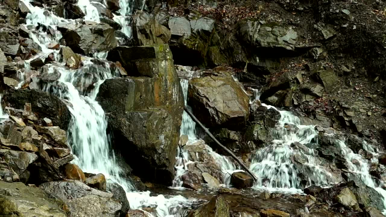 Download Stock Video Creek Flowing Through The Mountain Rocks Live Wallpaper For PC