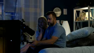 Download Stock Video Couple Watching A Horror Movie At Night Live Wallpaper For PC