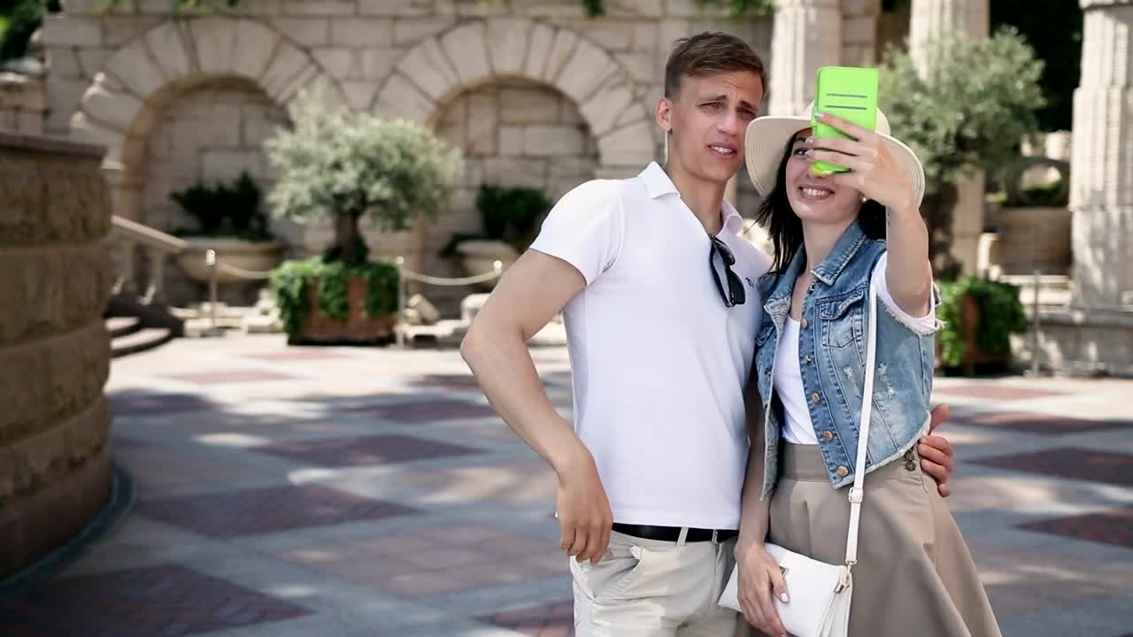 Download Stock Video Couple Taking Selfies During A Walk Live Wallpaper For PC