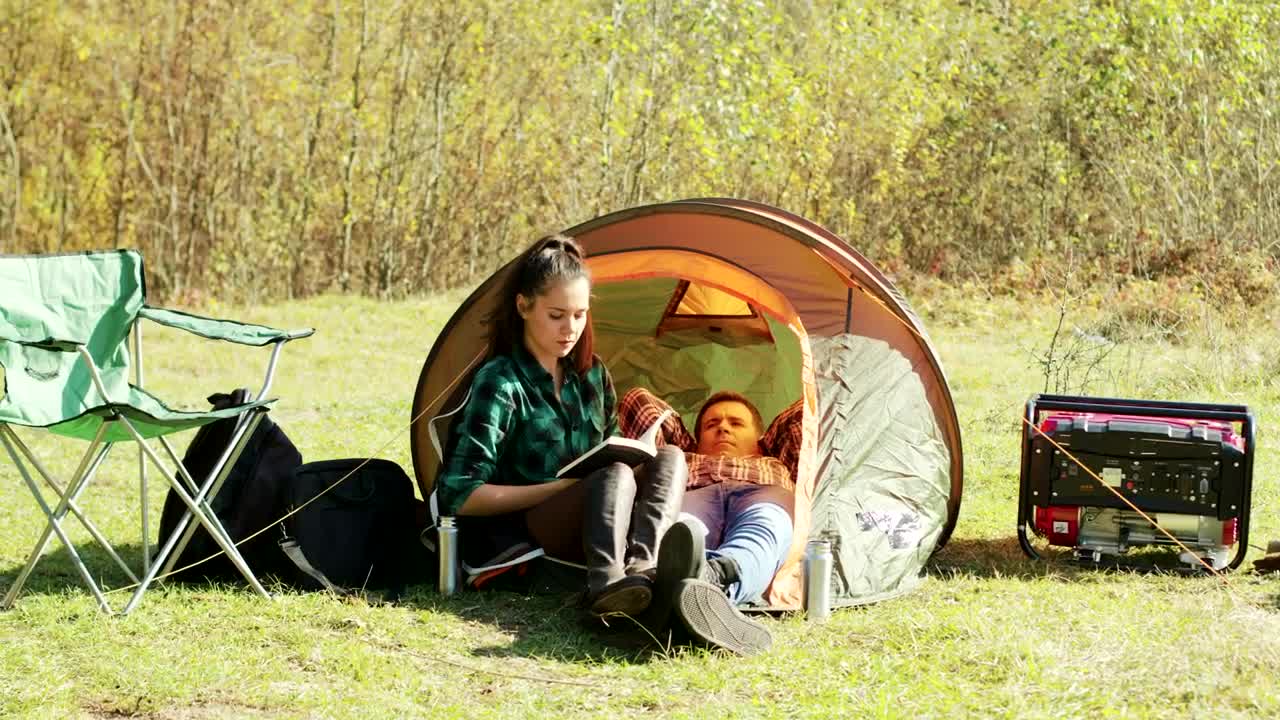 Download Stock Video Couple Laying In A Small Tent Live Wallpaper For PC