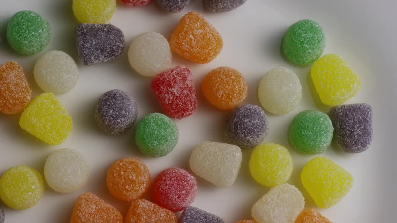 Download Stock Video Colored Sugary Gums Spinning Slowly Live Wallpaper For PC