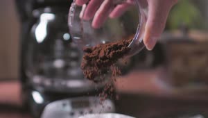 Download Stock Video Coffee Powder Being Poured On The Coffee Maker Filter Live Wallpaper For PC