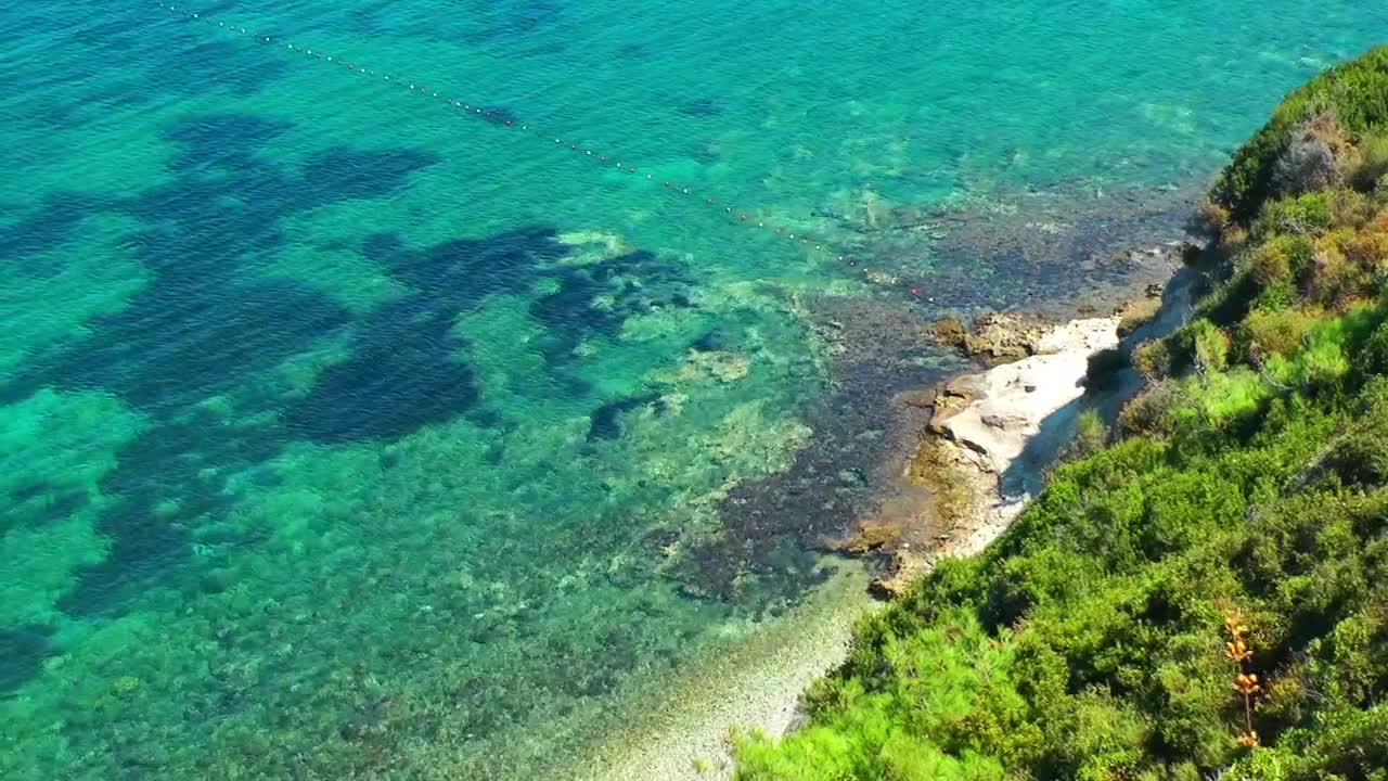 Download Stock Video Coast With Crystal Clear Sea Water In Summer Live Wallpaper For PC