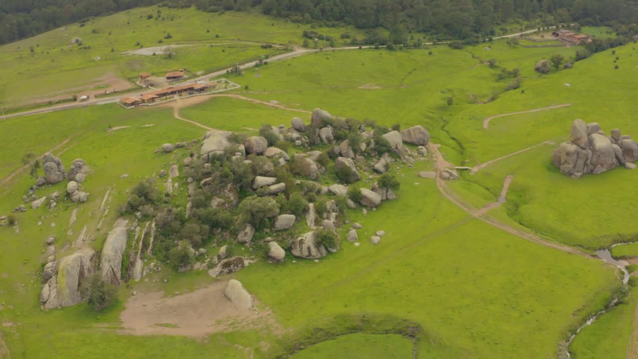 Download Stock Video Cluster Of Rocks In The Center Of A Huge Meadow Live Wallpaper For PC