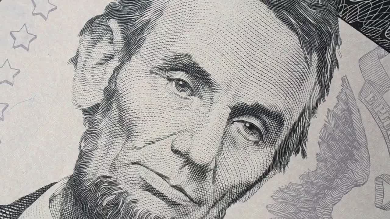 Download Stock Video Face Of Abraham Lincoln On A Spinning Banknote Live Wallpaper For PC