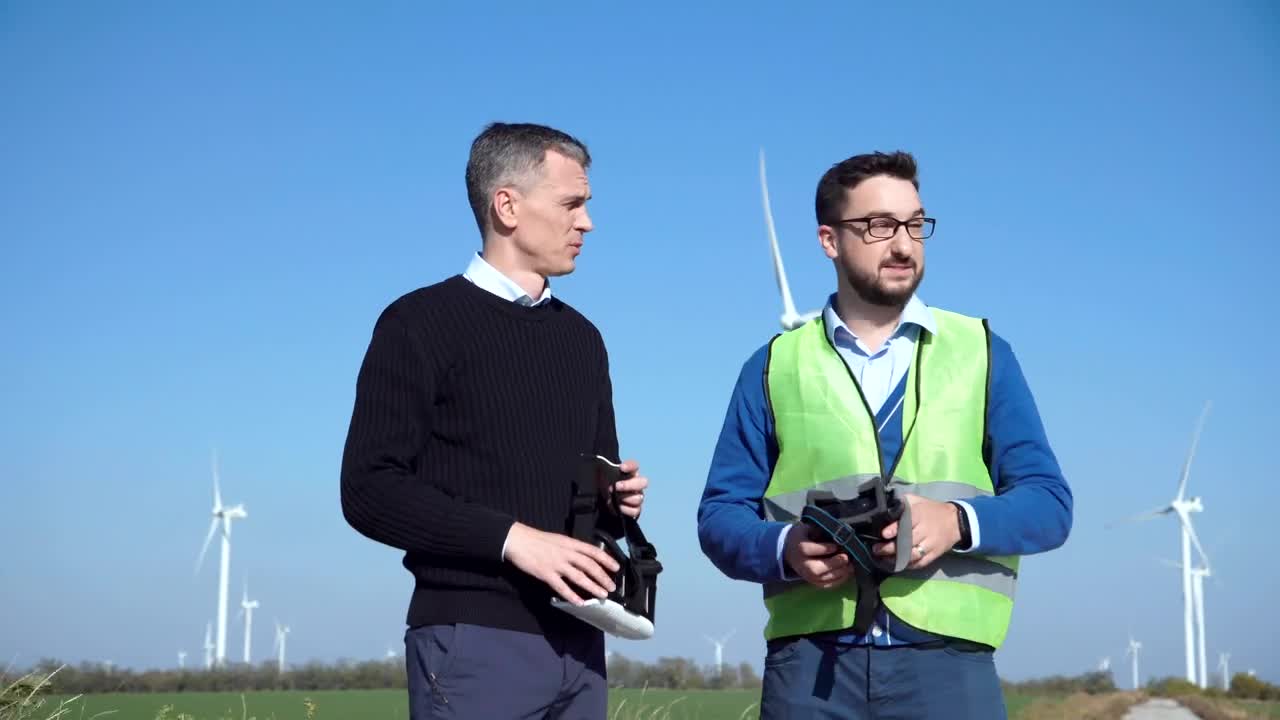 Download Stock Video Engineers Using Vr Headsets On Wind Farm Live Wallpaper For PC