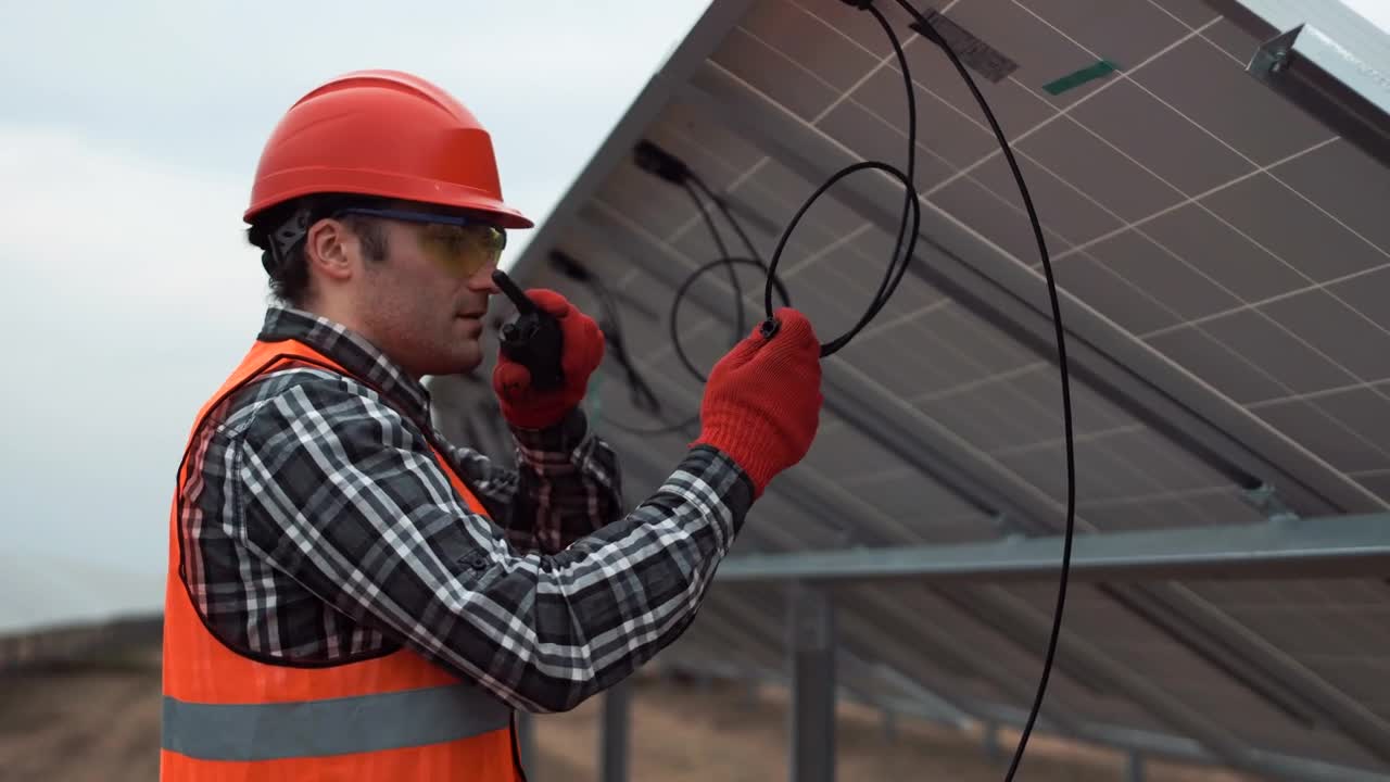 Download Stock Video Engineer Installing Solar Panels Live Wallpaper For PC