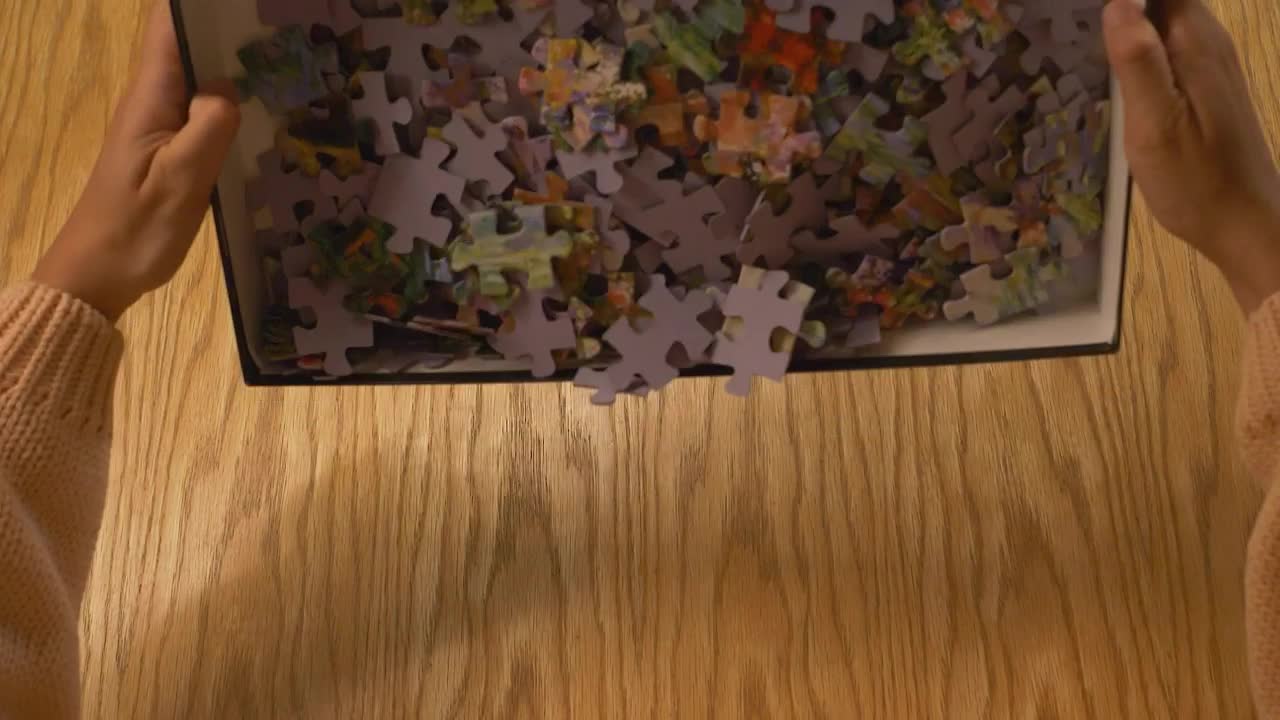 Download Stock Video Emptying A Box With Puzzle Pieces Live Wallpaper For PC