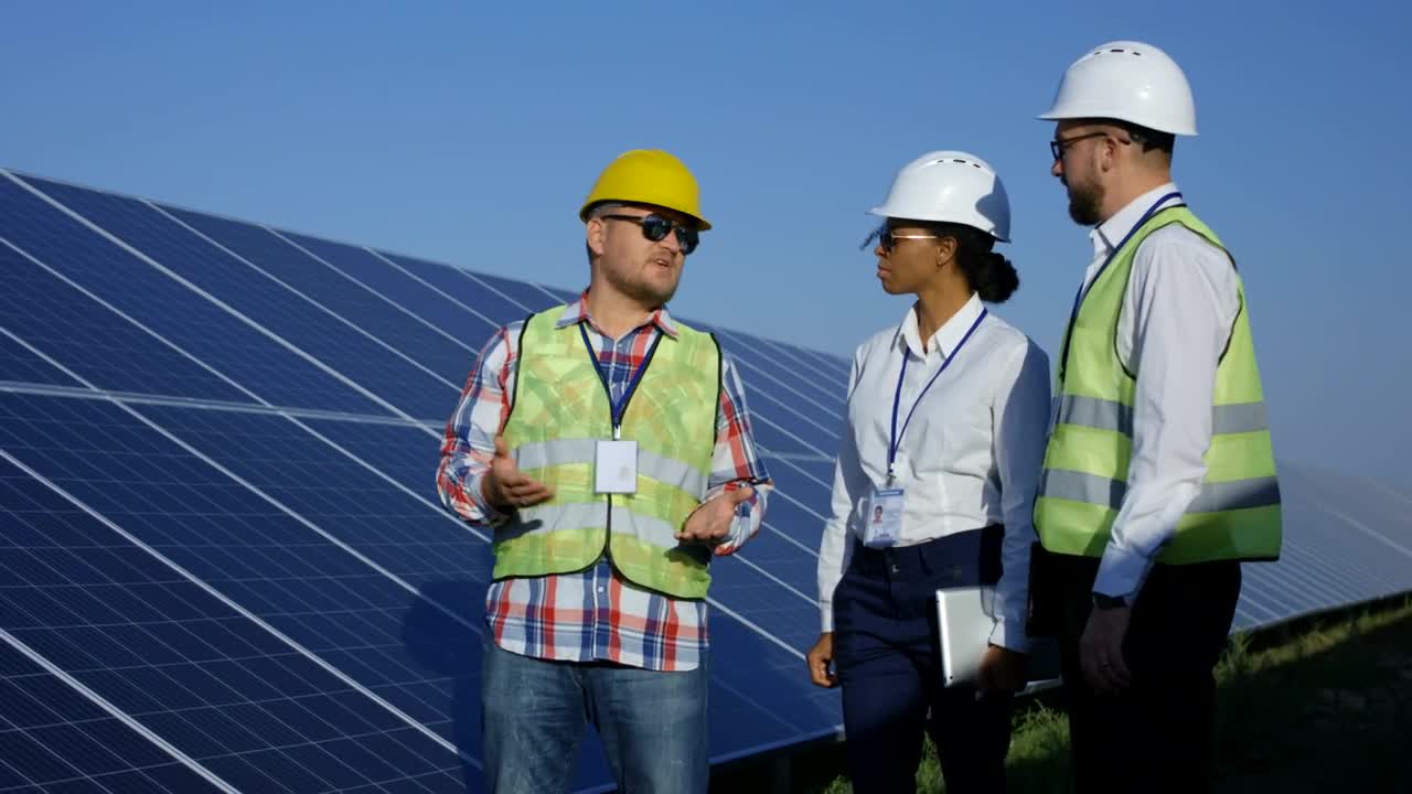 Download Stock Video Electrical Workers Checking Solar Panels Live Wallpaper For PC