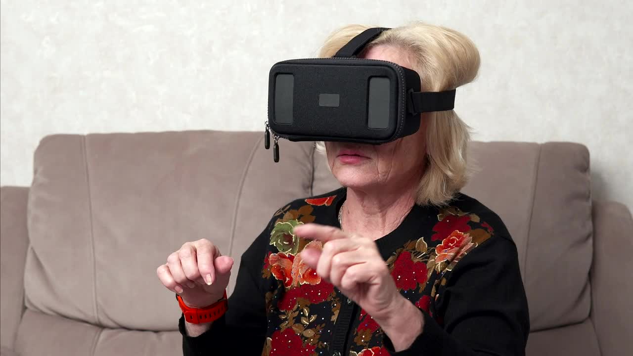 Download Stock Video Elderly Person Using A Vr Headset Live Wallpaper For PC