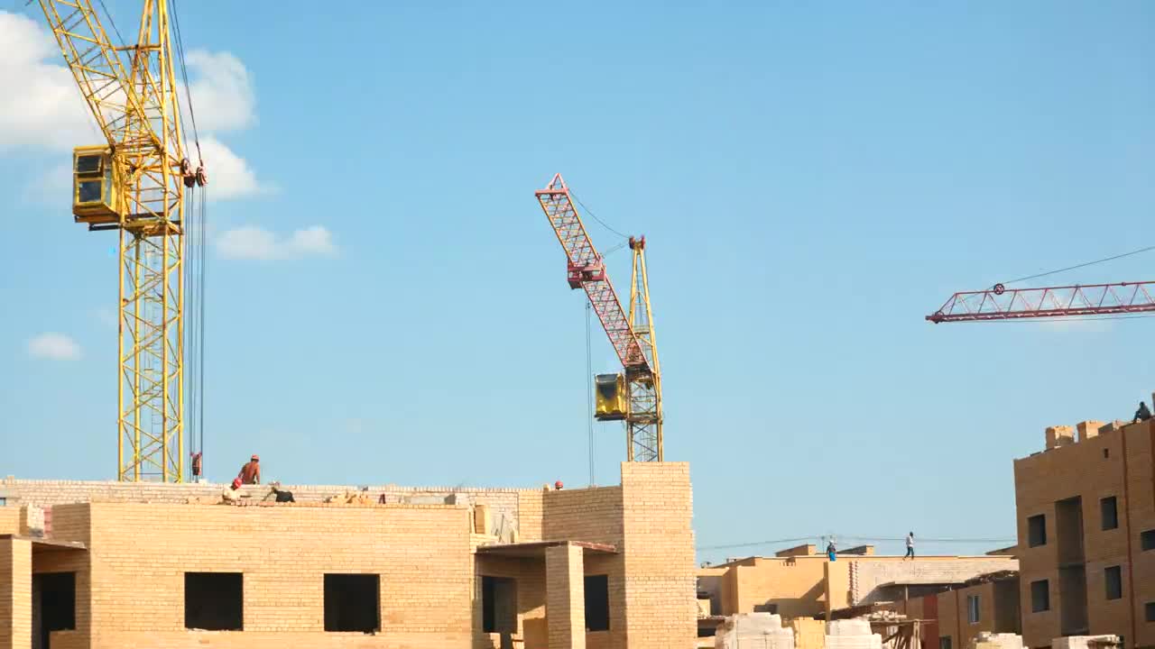 Download Stock Video Drones And Workers At The Construction Site Live Wallpaper For PC