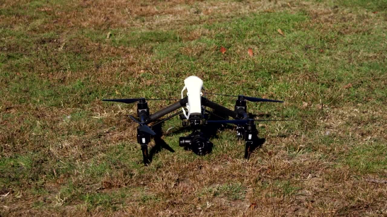 Download Stock Video Drone Preparing To Take Off From A Park Live Wallpaper For PC