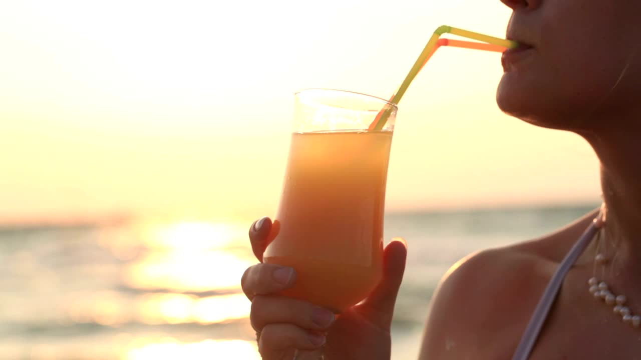 Download Stock Video Drinking An Orange Cocktail Live Wallpaper For PC