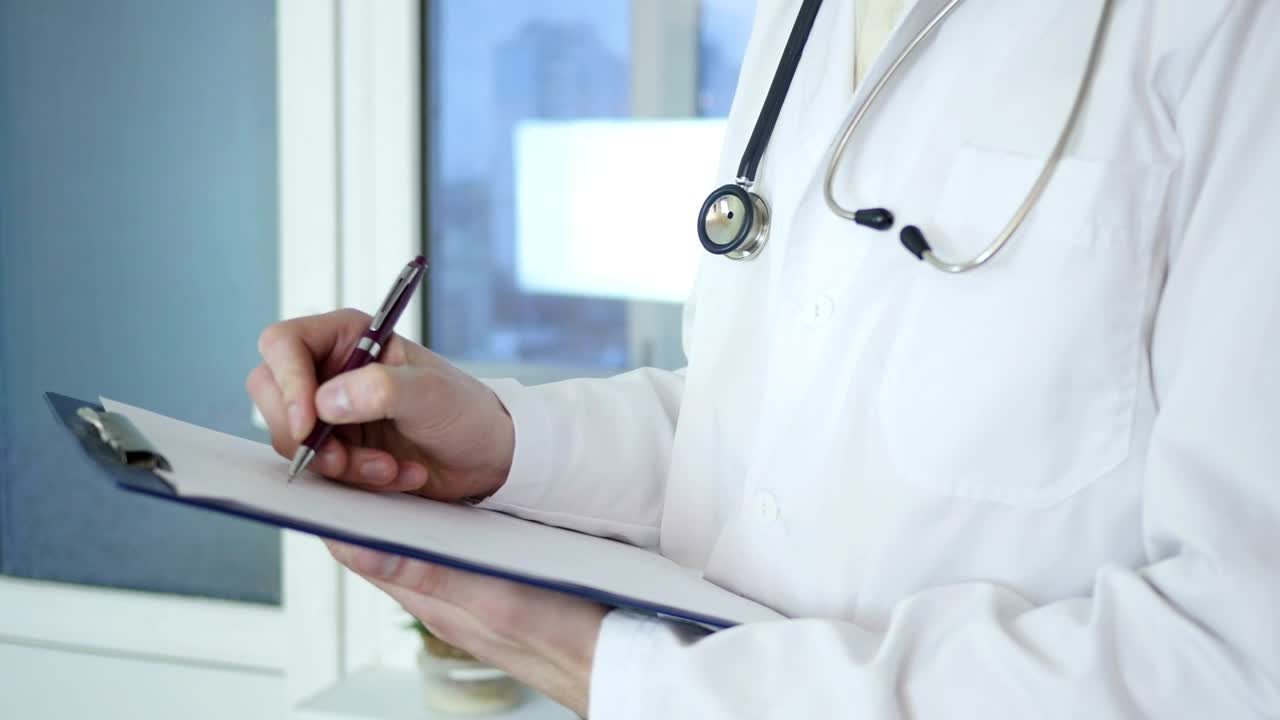 Download Stock Video Doctor Writing On Medical Record Live Wallpaper For PC