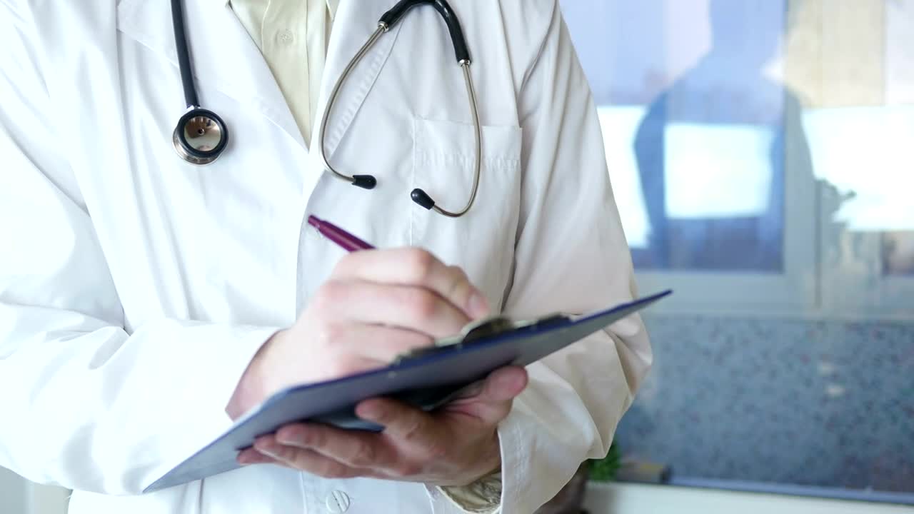 Download Stock Video Doctor Writing On A Medical Record Live Wallpaper For PC