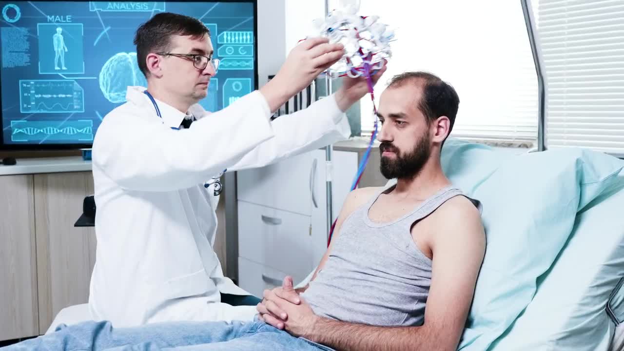 Download Stock Video Doctor Prepares Patient For Brain Scan In Hospital Live Wallpaper For PC