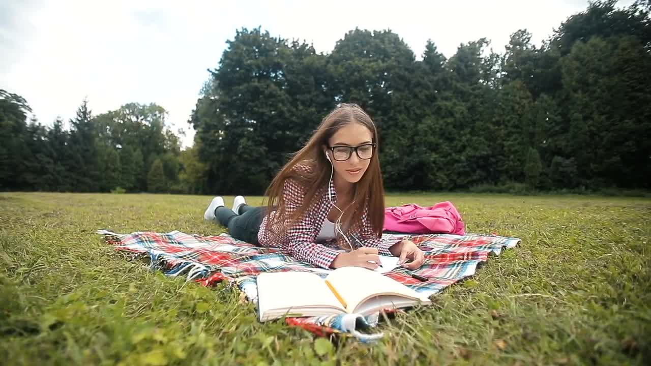 Download Stock Video Distance Education Student Listens To Lecture In Park Live Wallpaper For PC