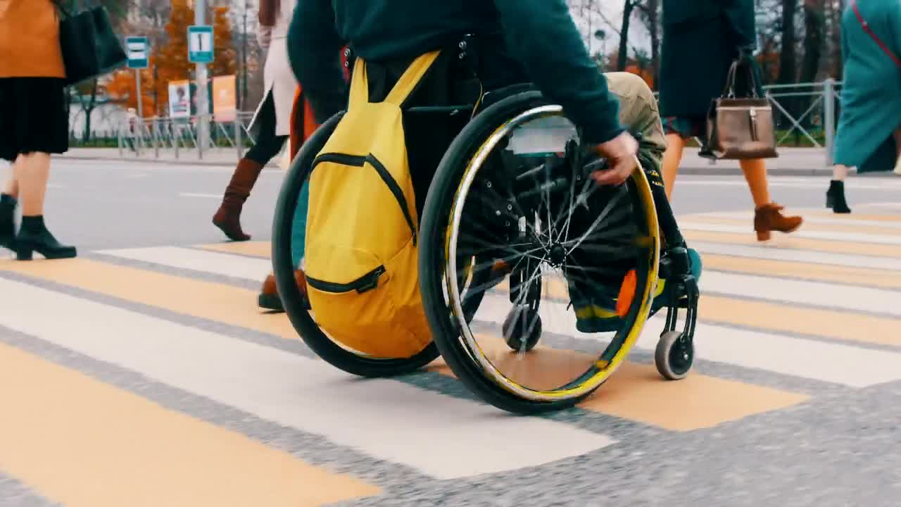 Download Stock Video Disabled Man On A Wheelchair On Pedestrian Crossing Live Wallpaper For PC