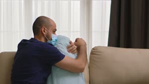 Download Stock Video Depressed Man Hugs Pillow In Coronavirus Quarantine Live Wallpaper For PC