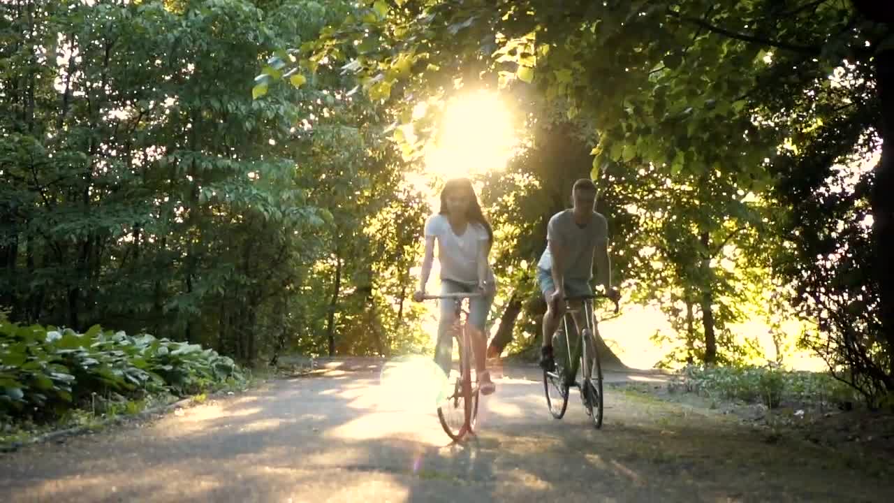 Download Stock Video Friends Enjoy Sunny Bike Ride In Park Live Wallpaper For PC