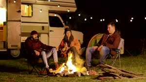 Download Stock Video Friends Enjoy A Quiet Night Around A Campfire Live Wallpaper For PC