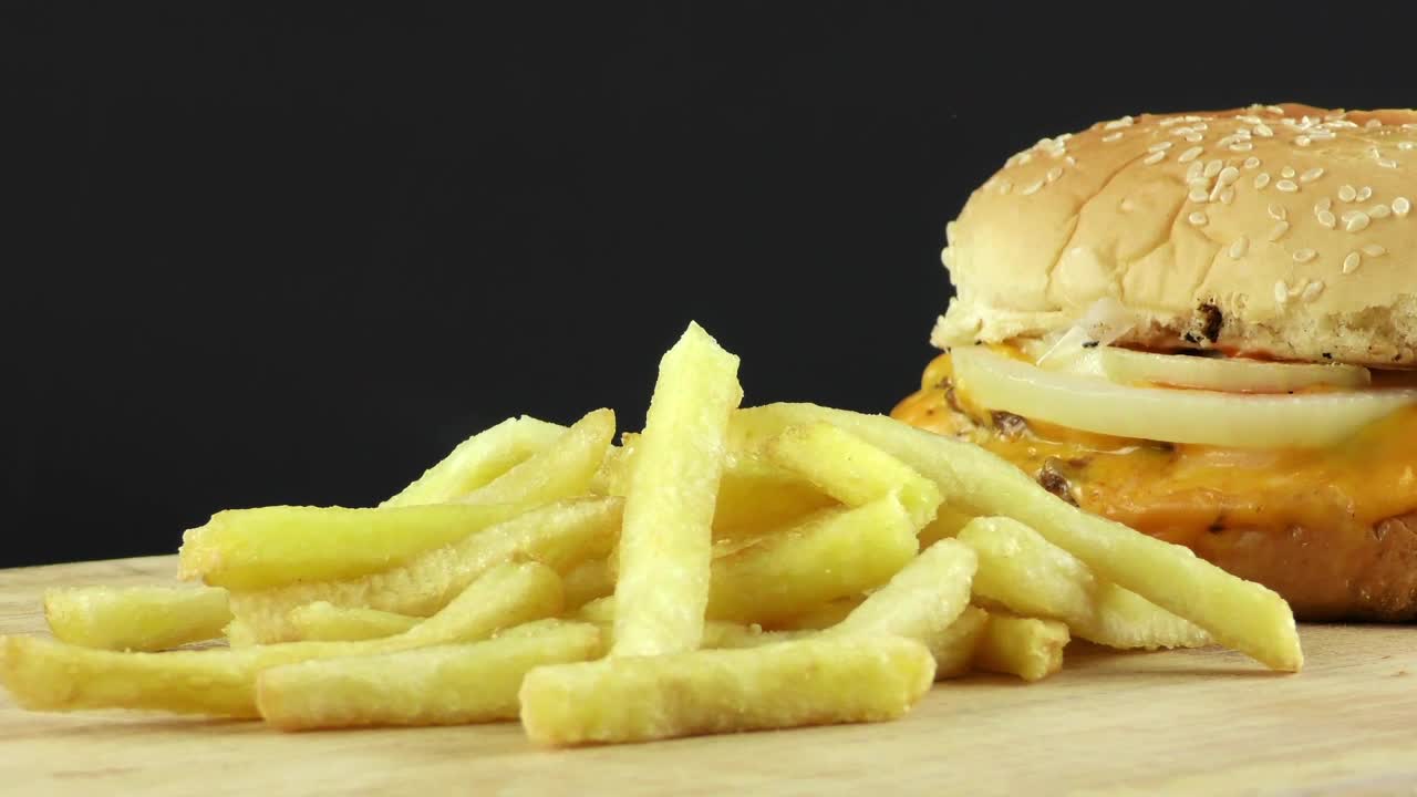 Download Stock Video French Fries Next To A Burger Live Wallpaper For PC