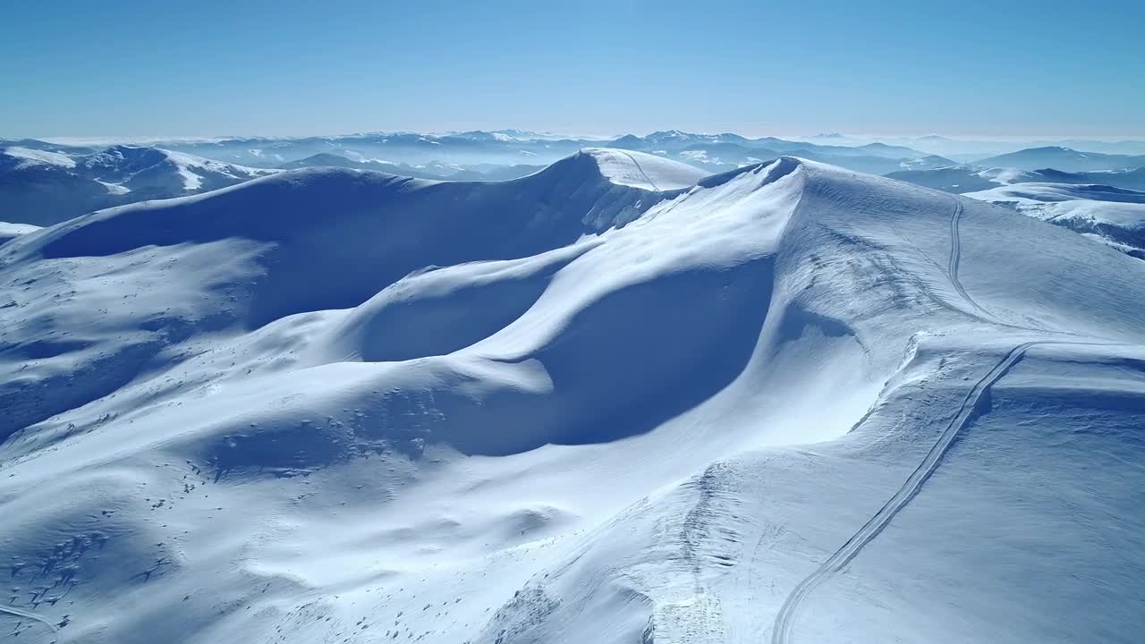 Download Stock Video Flying Over Turquoise Snowy Mountain Range Live Wallpaper For PC