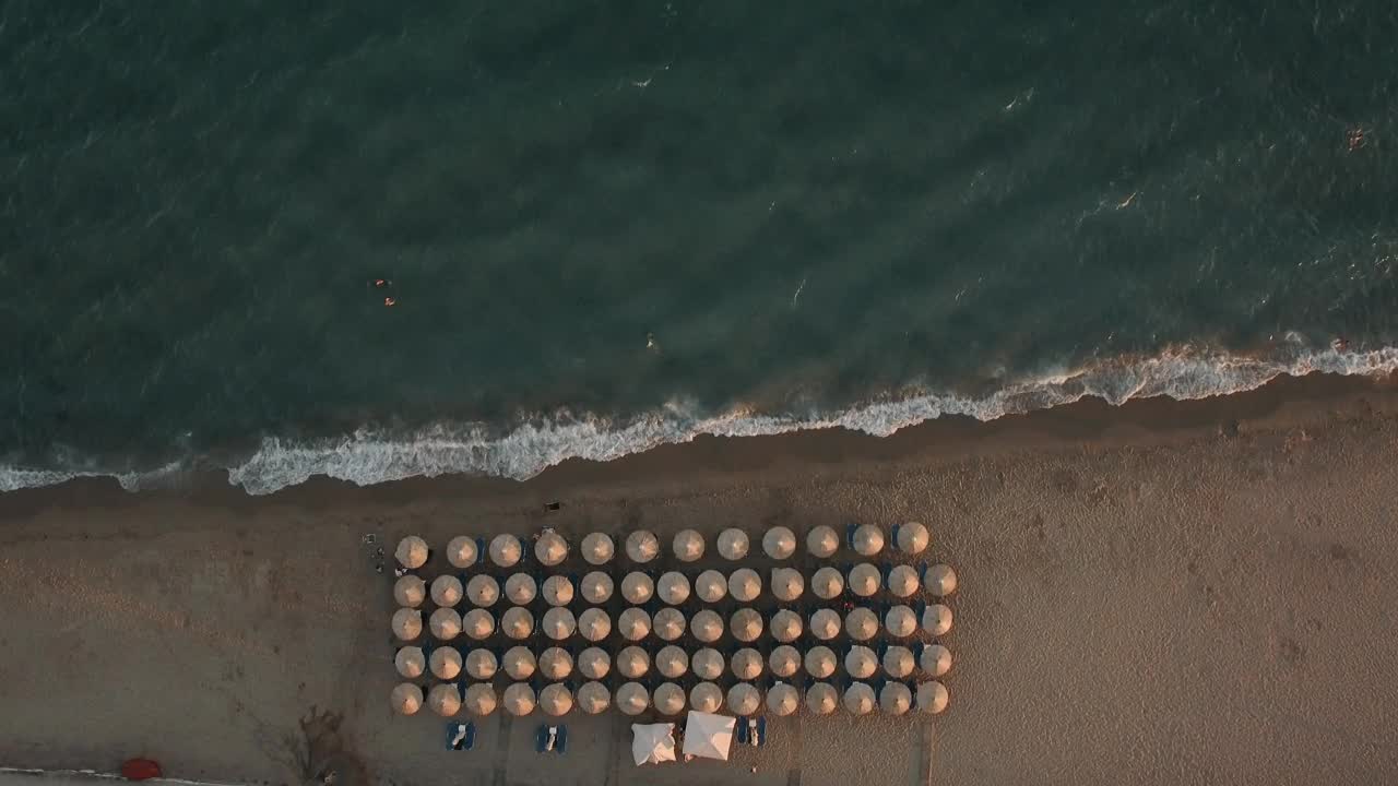 Download Stock Video Flying Over Straw Umbrellas Live Wallpaper For PC