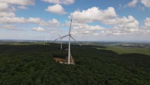 Download Stock Video Flying Over A Wind Farm On A Sunny Day Live Wallpaper For PC