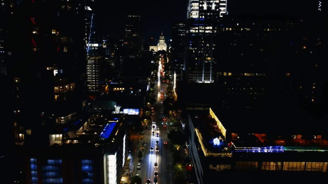 Download Stock Video Flying Over A Large Avenue In A City At Night Live Wallpaper For PC