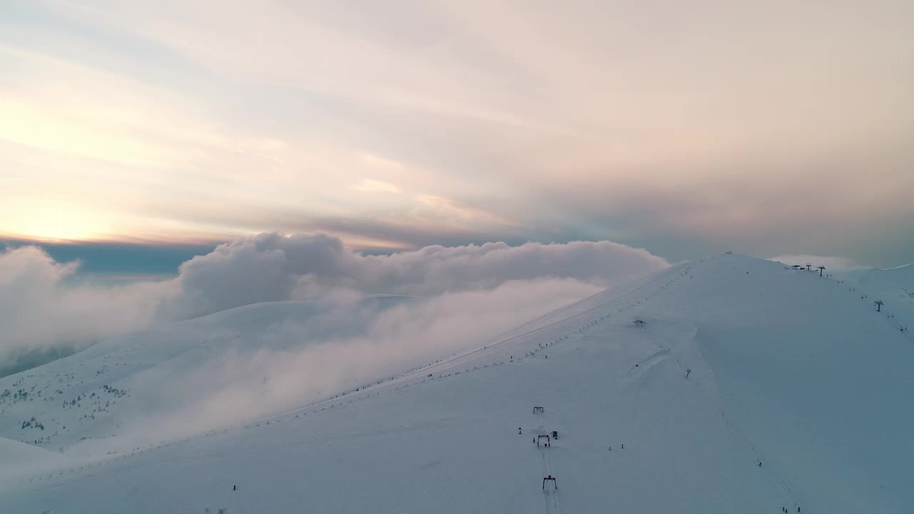 Download Stock Video Flying Over A Full Snow Covered Mountain Range Live Wallpaper For PC