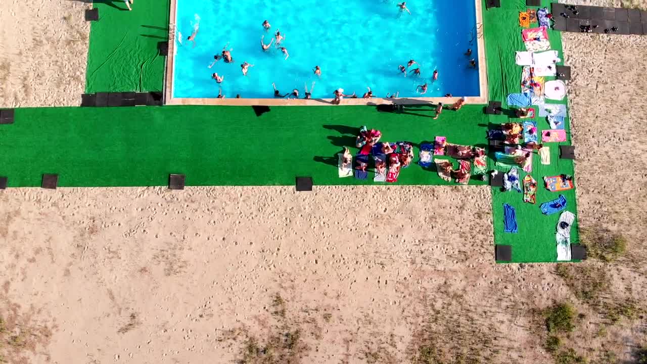 Download Stock Video Flying Over A Crowded Swimming Pool Live Wallpaper For PC