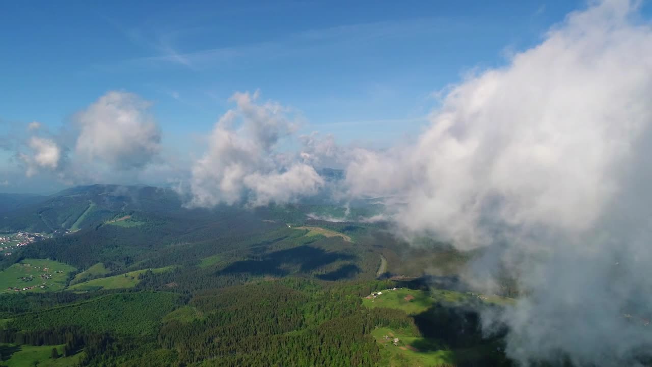 Download Stock Video Flying At Cloud Level With The Mountains Below Live Wallpaper For PC