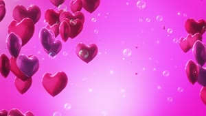 Download Stock Video Floating Heart Shaped Balloons On Pink Background And Bubbles Live Wallpaper For PC