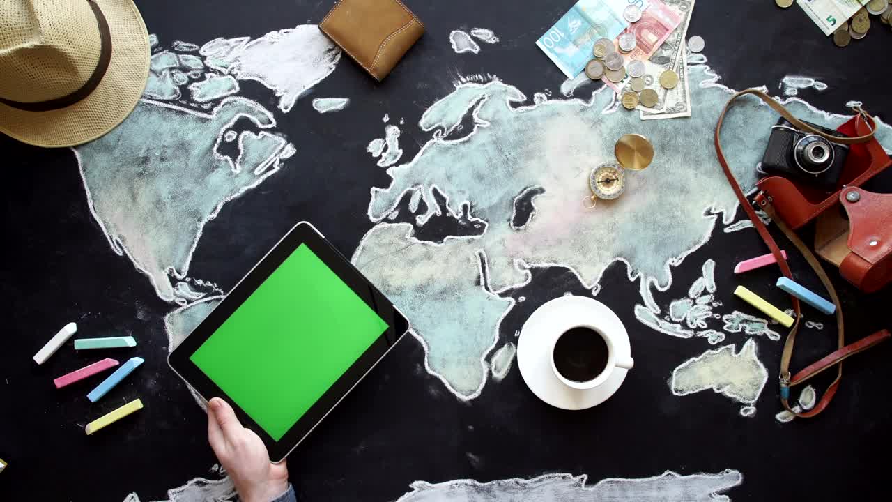 Download Stock Video Flatlay Of Money Travel Items And Hand Swiping Tablet Live Wallpaper For PC