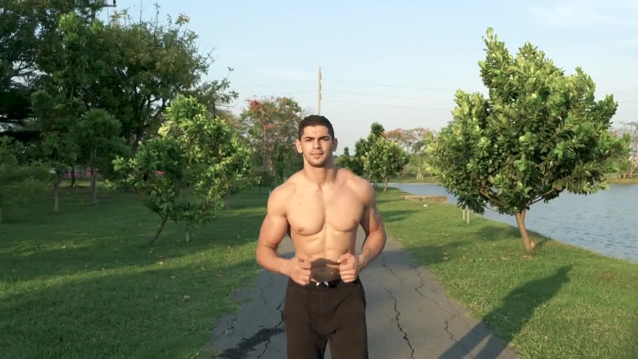 Download Stock Video Fitness Man Running Shirtless In The Park Live Wallpaper For PC