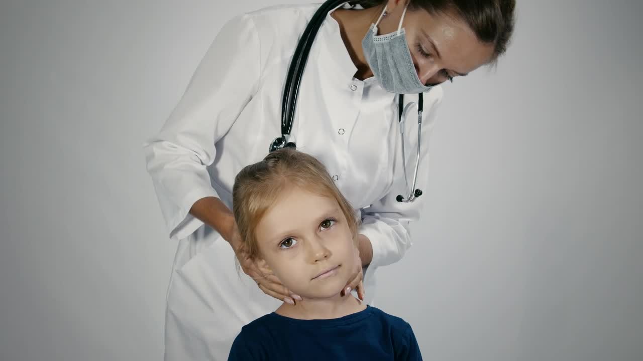 Download Stock Video Female Doctor Checking The Lymph Node Of The Child Live Wallpaper For PC