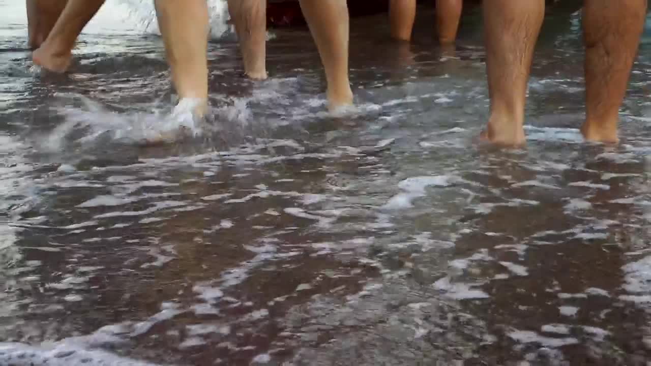 Download Stock Video Feet Of People In The Seashore Live Wallpaper For PC