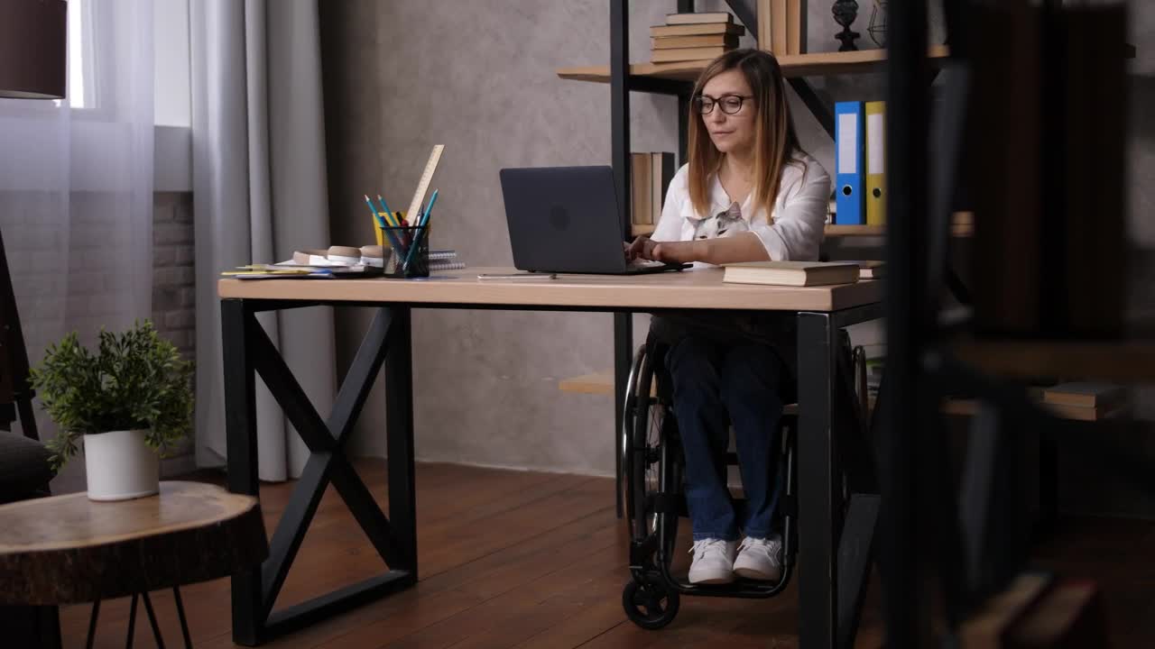 Download Stock Video Handicapped Woman Working From Home Live Wallpaper For PC