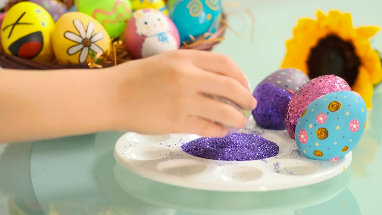 Download Stock Video Hand Of A Girl Decorating Easter Eggs Live Wallpaper For PC