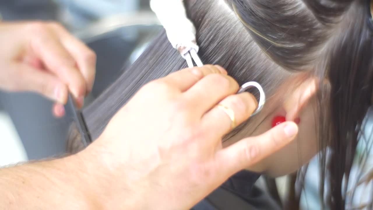 Download Stock Video Hairstylist Cutting Womans Hair With Fire Live Wallpaper For PC