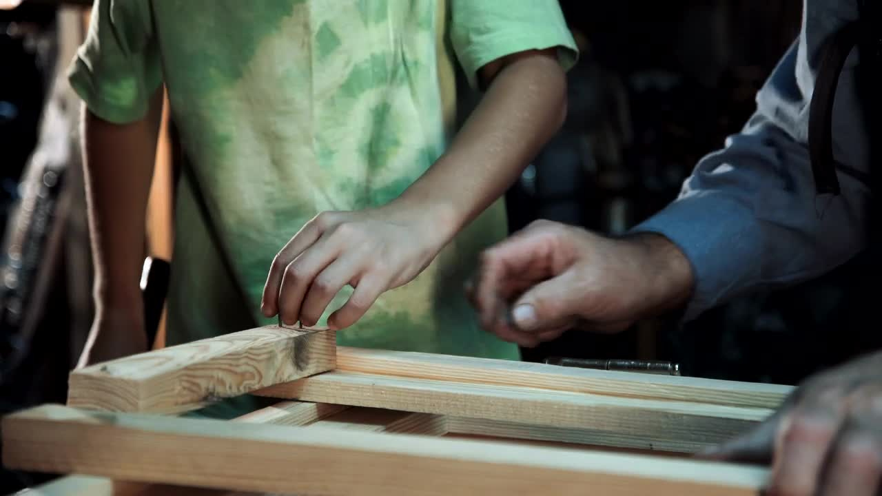 Download Stock Video Grandson Helping His Grandfather With Carpentry Live Wallpaper For PC