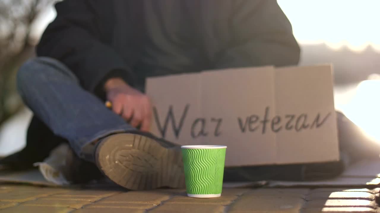 Download Stock Video Giving Money To A Homeless Man Live Wallpaper For PC