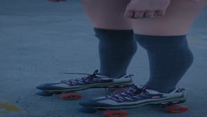 Download Stock Video Girl With Roller Skates Standing In The Middle Of A Live Wallpaper For PC